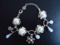 PULSEIRA PRATA COM FLORES E PEDRAS USADO